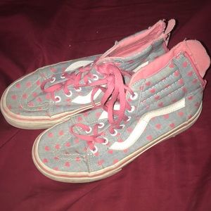 Grey Vans with pink hearts and laces.